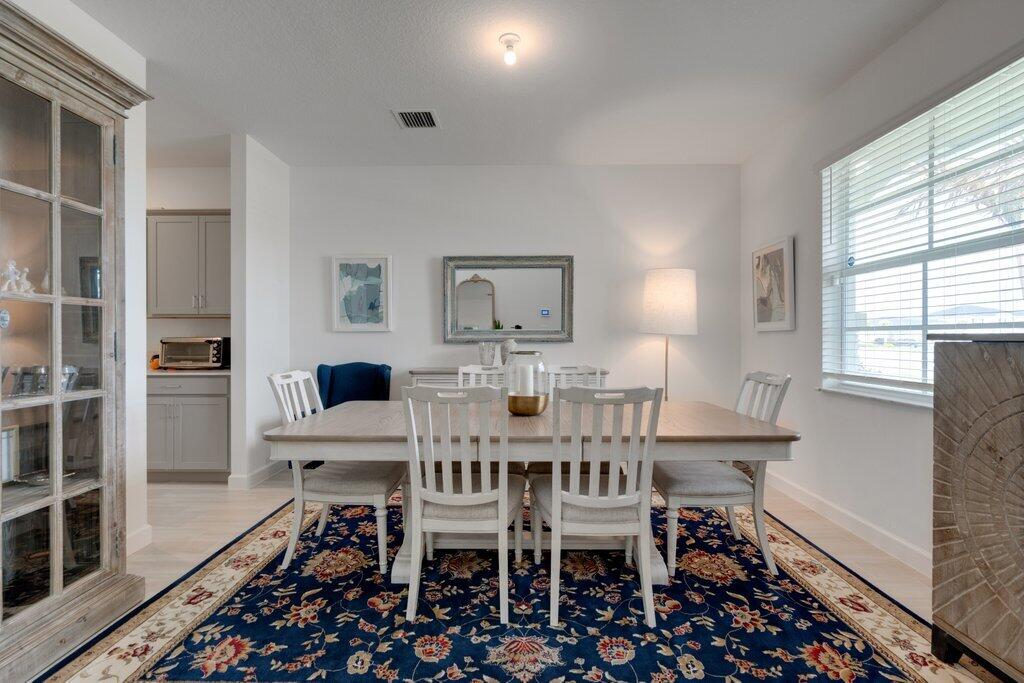 12328 Southwest Roma Circle Port St. Lucie, FL 34987 - Photo 8 of 72 Dining.jpg-SMALL