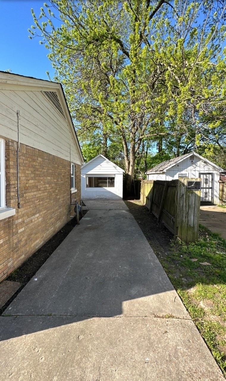 3333 Farmville Road Memphis, TN 38122 - Photo 12 of 12 a view of a back yard of the house