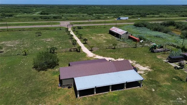 a outdoor space with patio furniture and a fireplace
