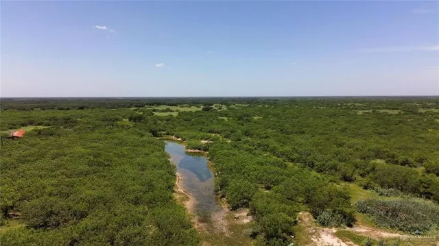a view of a lake with houses with outdoor space