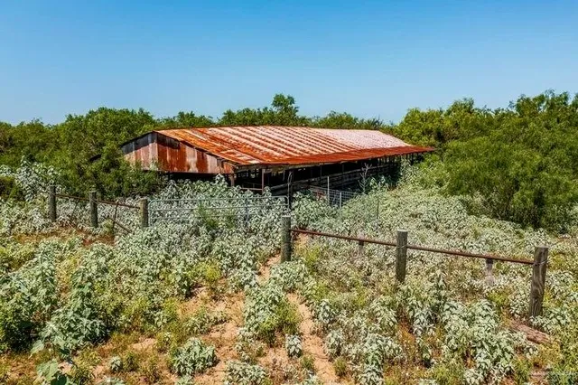 a swimming pool with outdoor seating