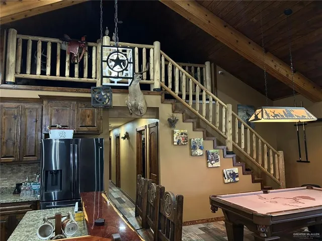 a bedroom with a bed and furniture