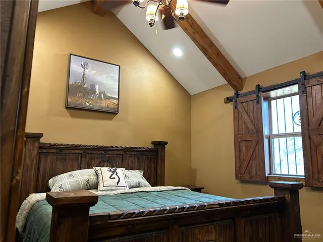 a kitchen with wooden cabinets and a sink
