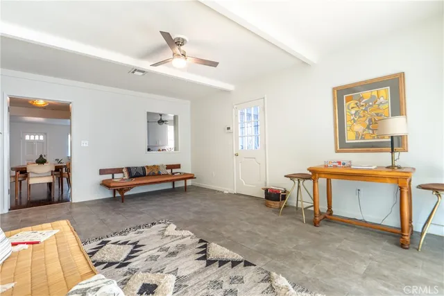 a view of a livingroom with furniture and a rug
