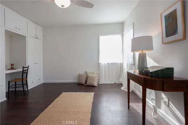 a room with furniture and wooden floor