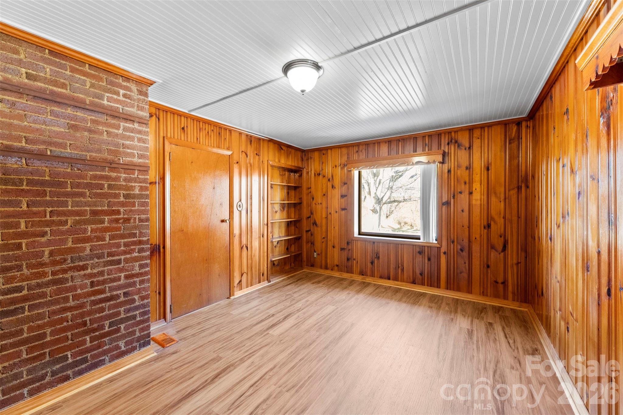 845 St Marks Church Road Cherryville, NC 28021 - Photo 22 of 47 a view of an empty room with glass door and wooden floor