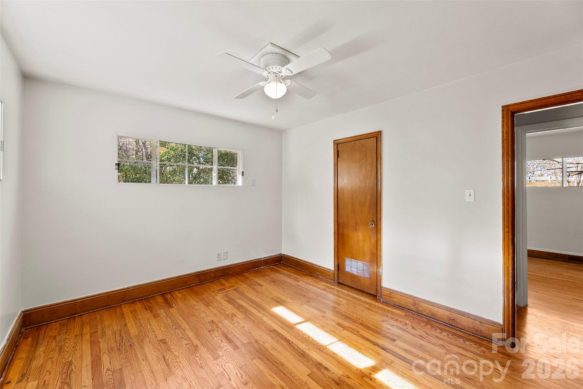 845 St Marks Church Road Cherryville, NC 28021 - Photo 30 of 47 a view of an empty room with wooden floor