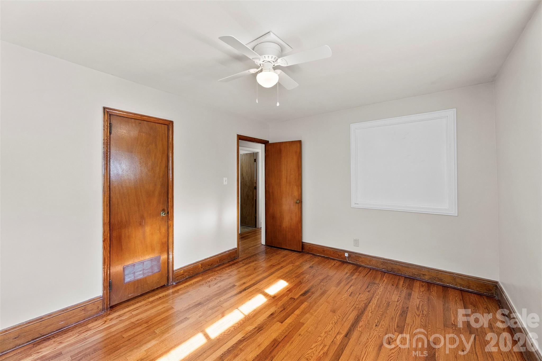 845 St Marks Church Road Cherryville, NC 28021 - Photo 31 of 47 a view of an empty room with wooden floor