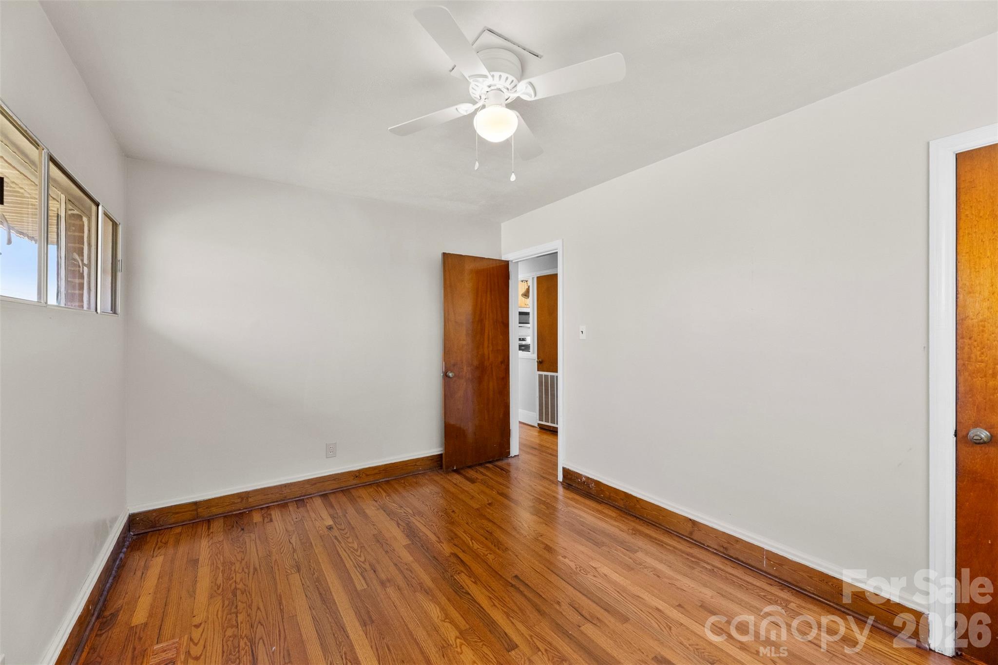 845 St Marks Church Road Cherryville, NC 28021 - Photo 36 of 47 a view of an empty room with wooden floor