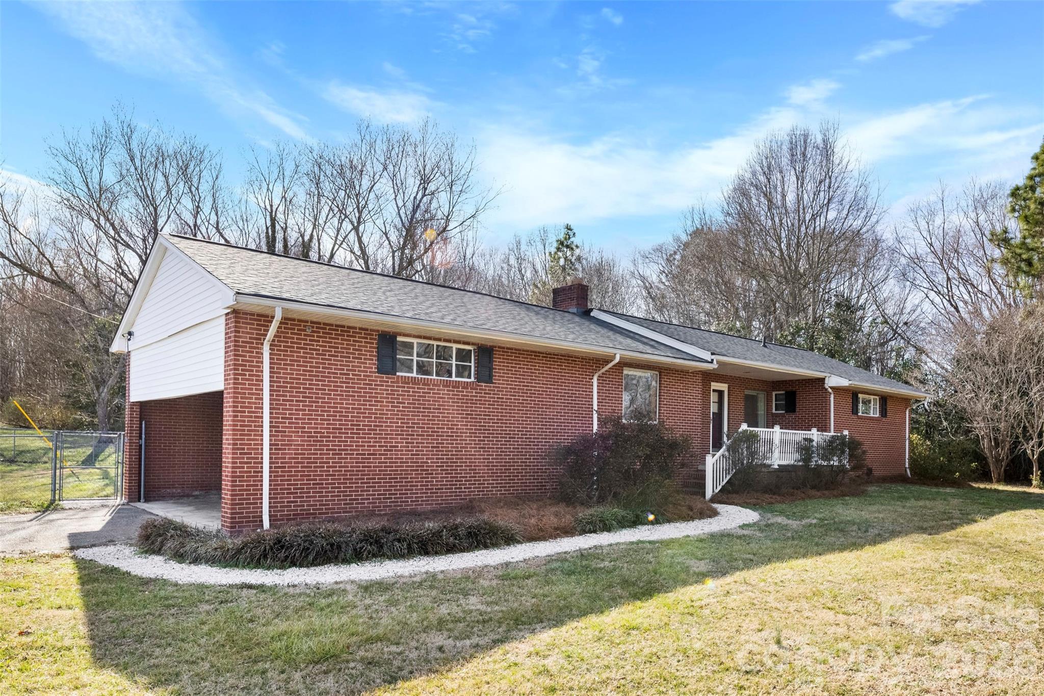 845 St Marks Church Road Cherryville, NC 28021 - Photo 4 of 47 a front view of a house with garden
