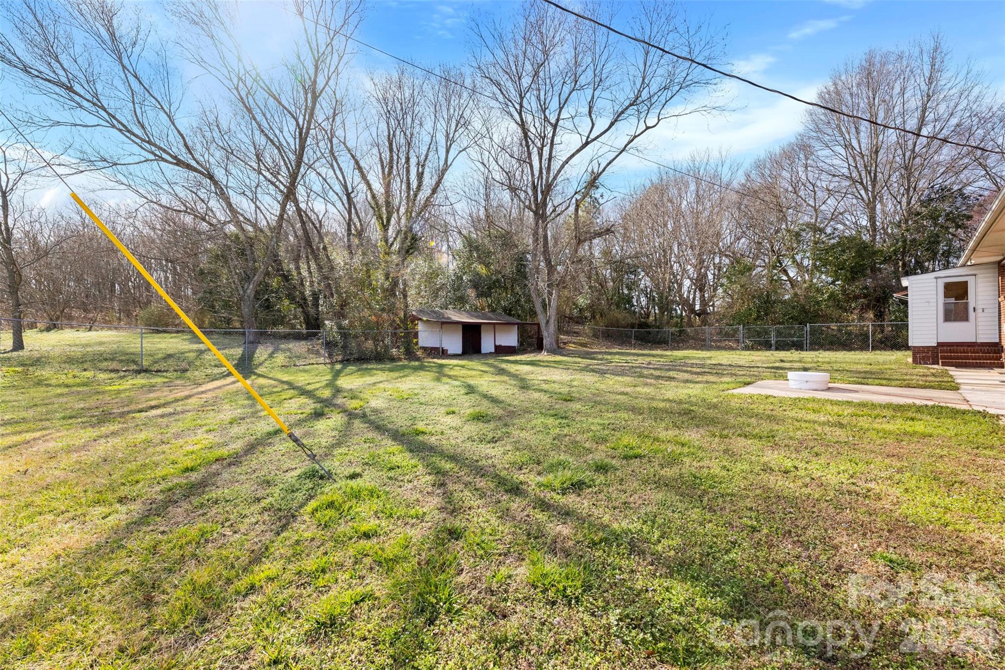 845 St Marks Church Road Cherryville, NC 28021 - Photo 45 of 47 a view of a swimming pool with a house in the background