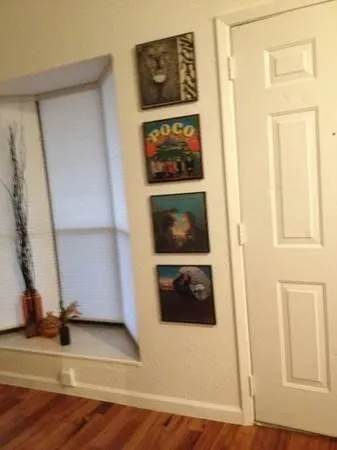 a kitchen with stainless steel appliances granite countertop a sink and a refrigerator