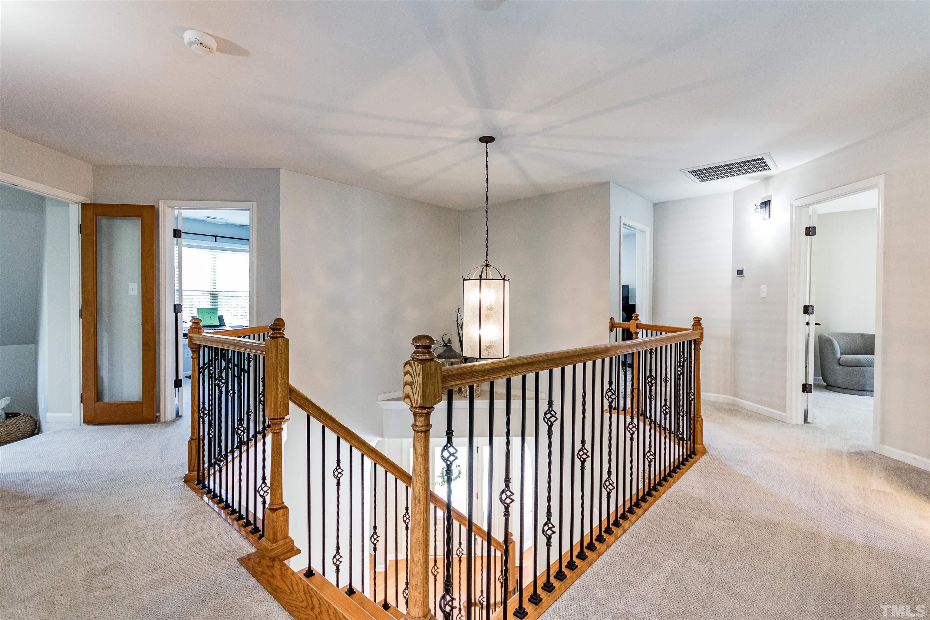 9009 Cornwell Drive Wake Forest, NC 27587 - Photo 16 of 36 a view of a hallway view with staircase