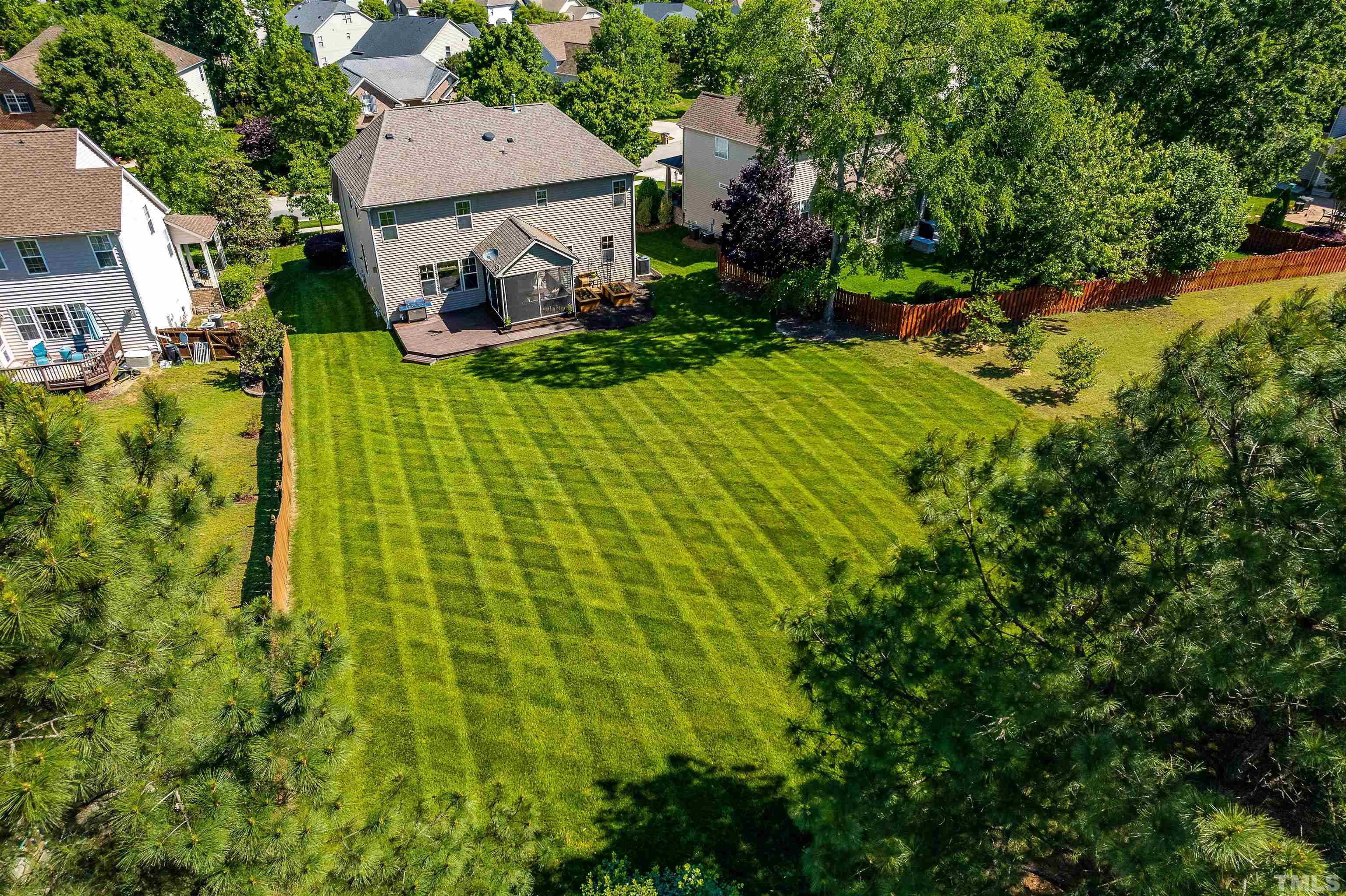 9009 Cornwell Drive Wake Forest, NC 27587 - Photo 34 of 36 a view of a house with a yard
