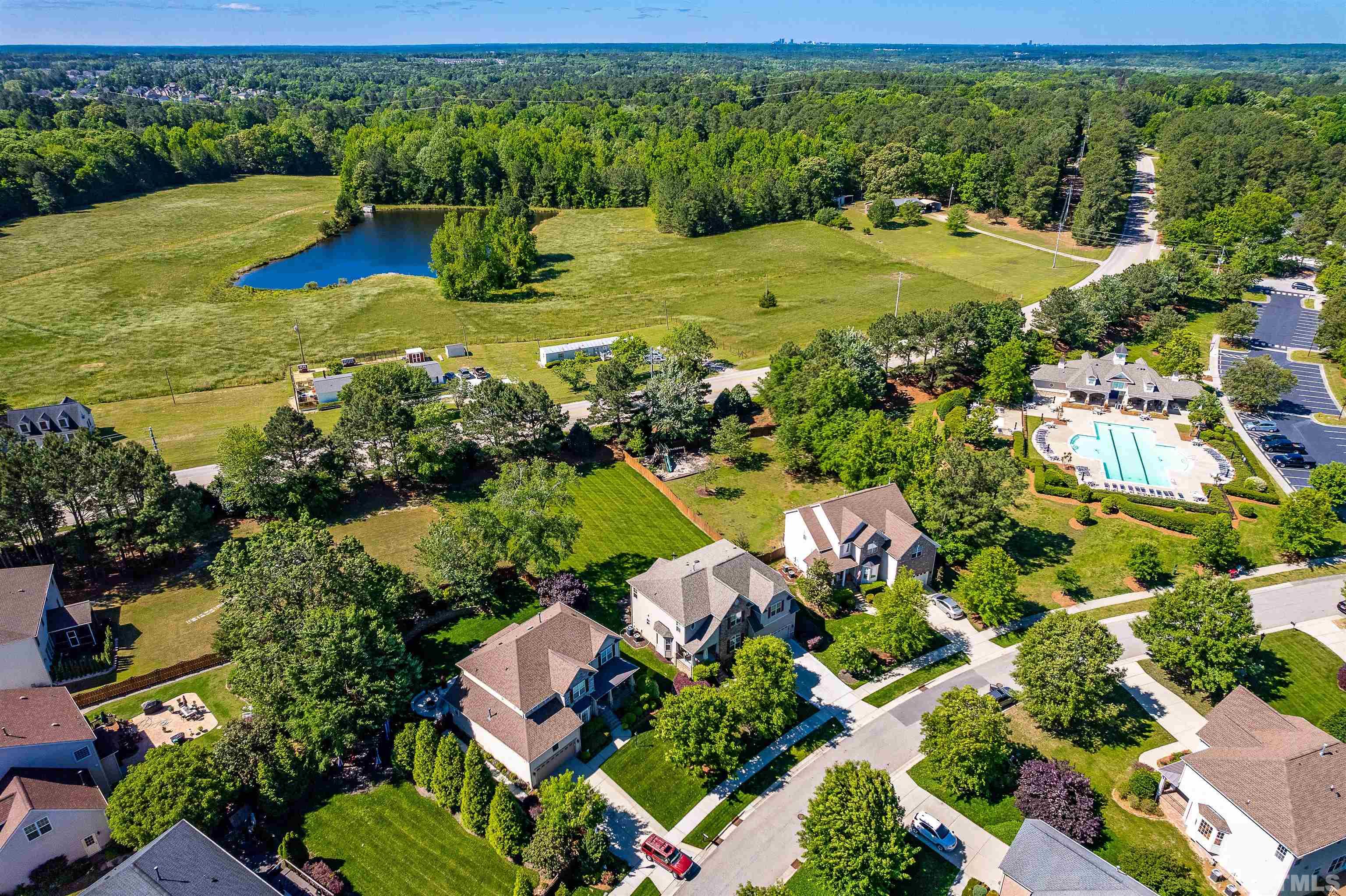 9009 Cornwell Drive Wake Forest, NC 27587 - Photo 36 of 36 an aerial view of a house with a garden