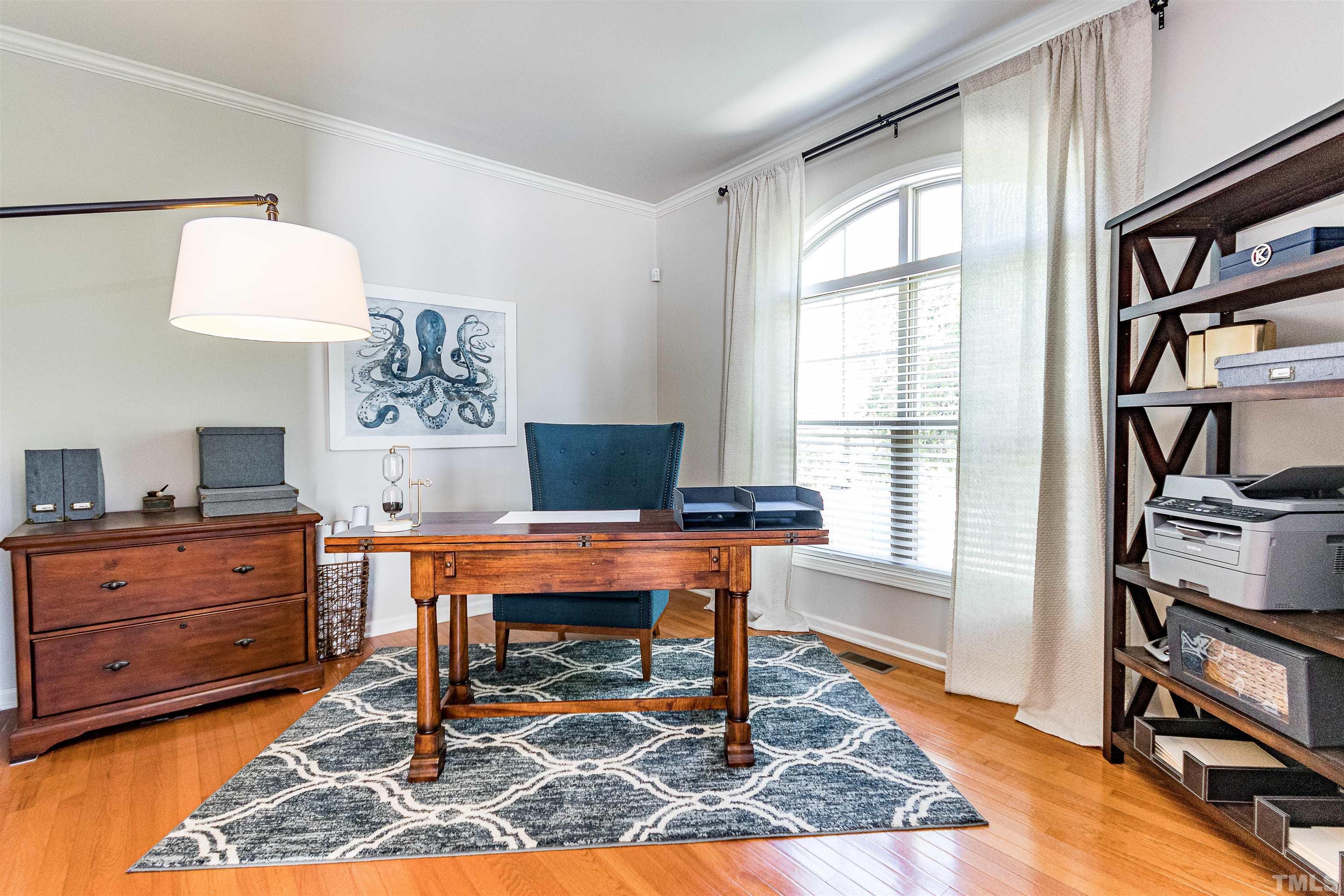 9009 Cornwell Drive Wake Forest, NC 27587 - Photo 5 of 36 a view of a workspace with furniture and a window
