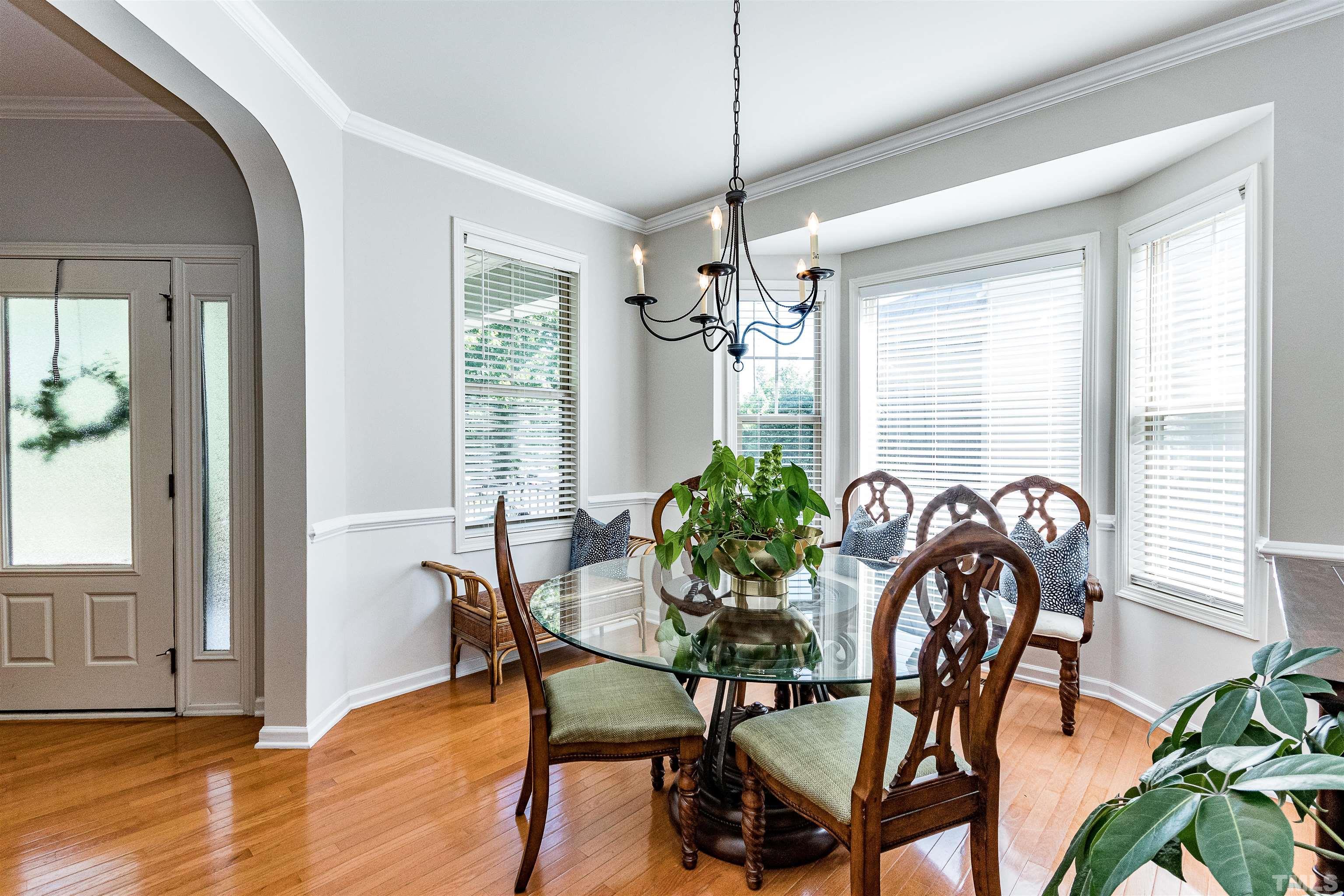 9009 Cornwell Drive Wake Forest, NC 27587 - Photo 6 of 36 a view of a dining room with furniture window and outside view