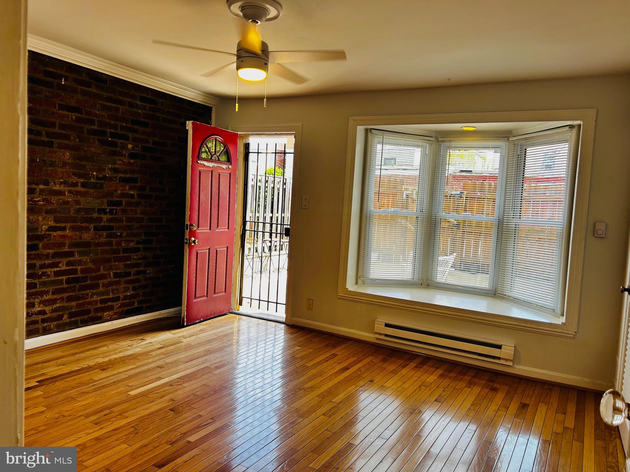 225 10th Street Northeast, Unit 1 Washington, DC 20002 - Photo 8 of 14 bedroom 2 with door to private patio