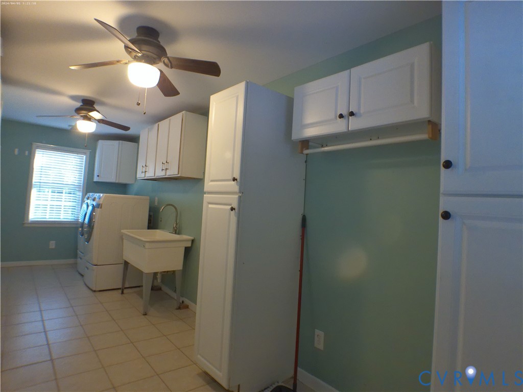 9418 North Rinker Drive Mechanicsville, VA 23116 - Photo 27 of 29 40 Inch Laundry Sink and cabinet storage