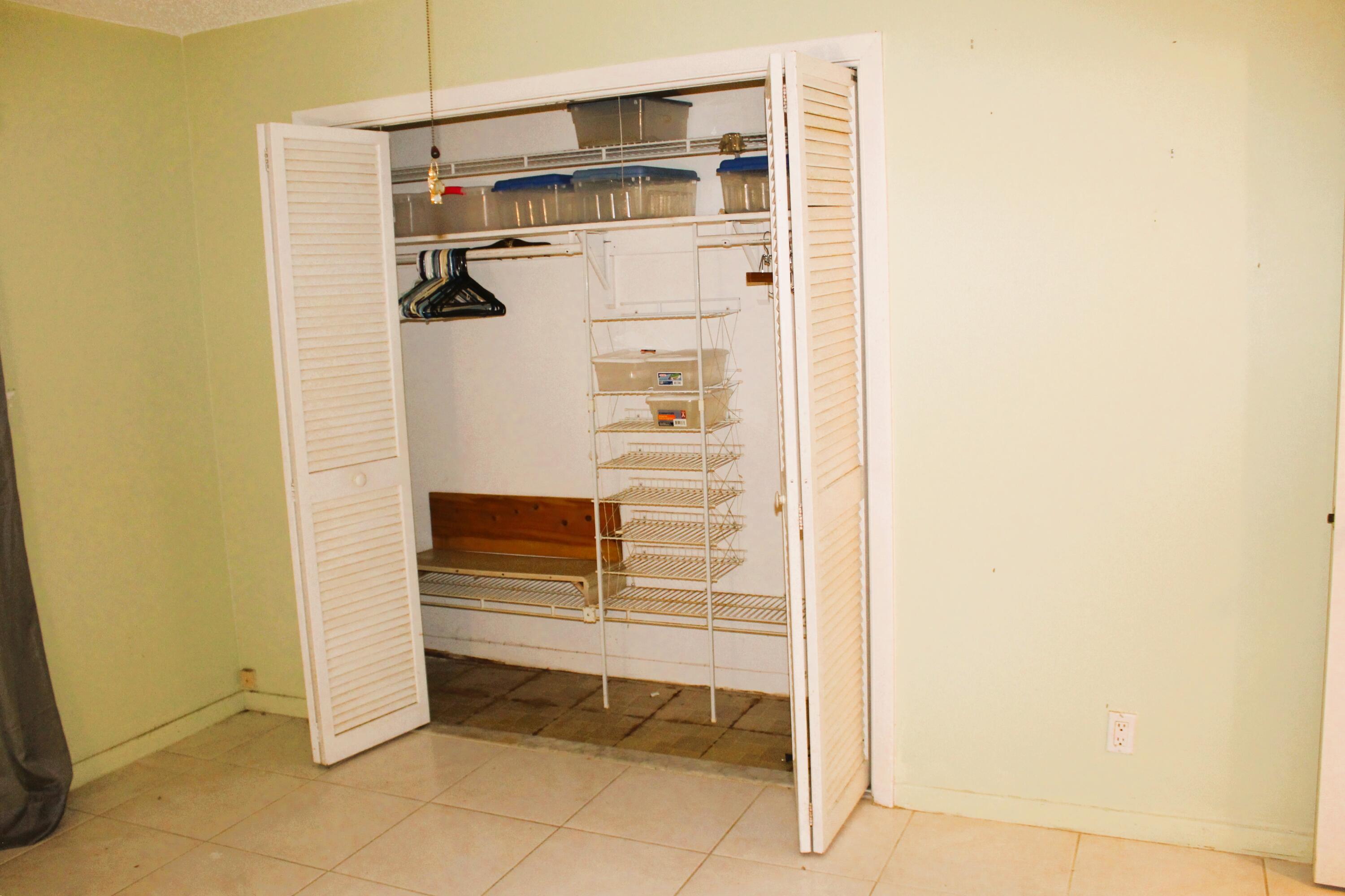 455 High Point Boulevard, Unit D Delray Beach, FL 33445 - Photo 8 of 18 Bedroom 2 closet