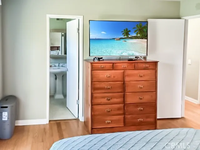 a view of a dresser with mirror
