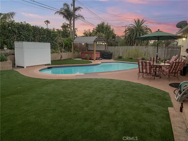 a view of a backyard with a patio
