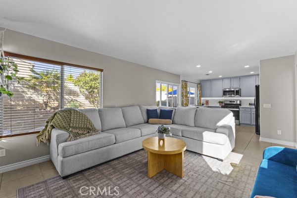 26932 St Julian Circle Murrieta, CA 92563 - Photo 11 of 37 a living room with furniture and a large window