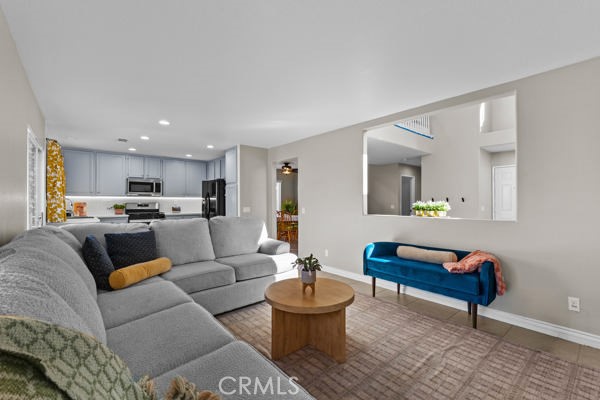 26932 St Julian Circle Murrieta, CA 92563 - Photo 12 of 37 a living room with furniture and a mirror