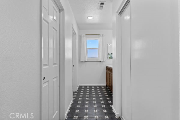 26932 St Julian Circle Murrieta, CA 92563 - Photo 18 of 37 a bathroom with a sink and a mirror