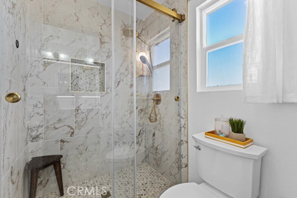 26932 St Julian Circle Murrieta, CA 92563 - Photo 20 of 37 a bathroom with a shower and a toilet