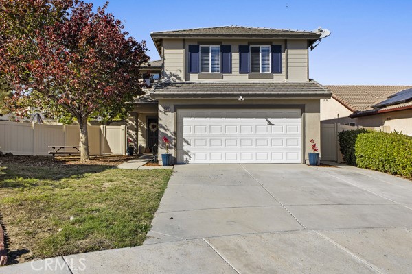 26932 St Julian Circle Murrieta, CA 92563 - Photo 2 of 37 a front view of a house with garden
