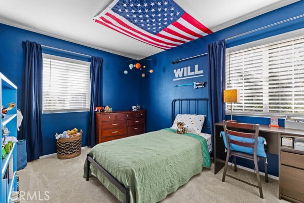 26932 St Julian Circle Murrieta, CA 92563 - Photo 21 of 37 a bedroom with a bed and a closet