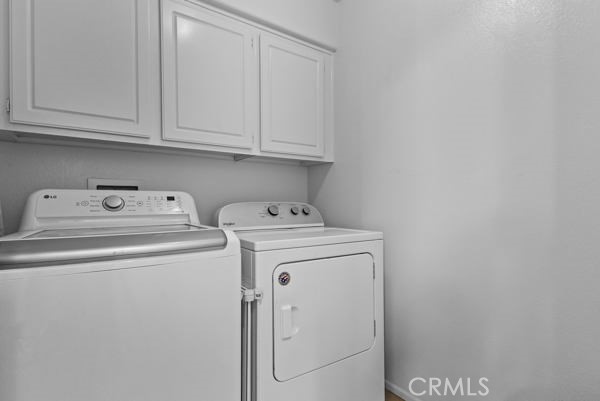 26932 St Julian Circle Murrieta, CA 92563 - Photo 27 of 37 a utility room with dryer and washer