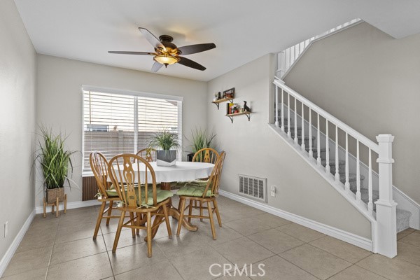 26932 St Julian Circle Murrieta, CA 92563 - Photo 9 of 37 a view of a dining room with furniture window and wooden floor