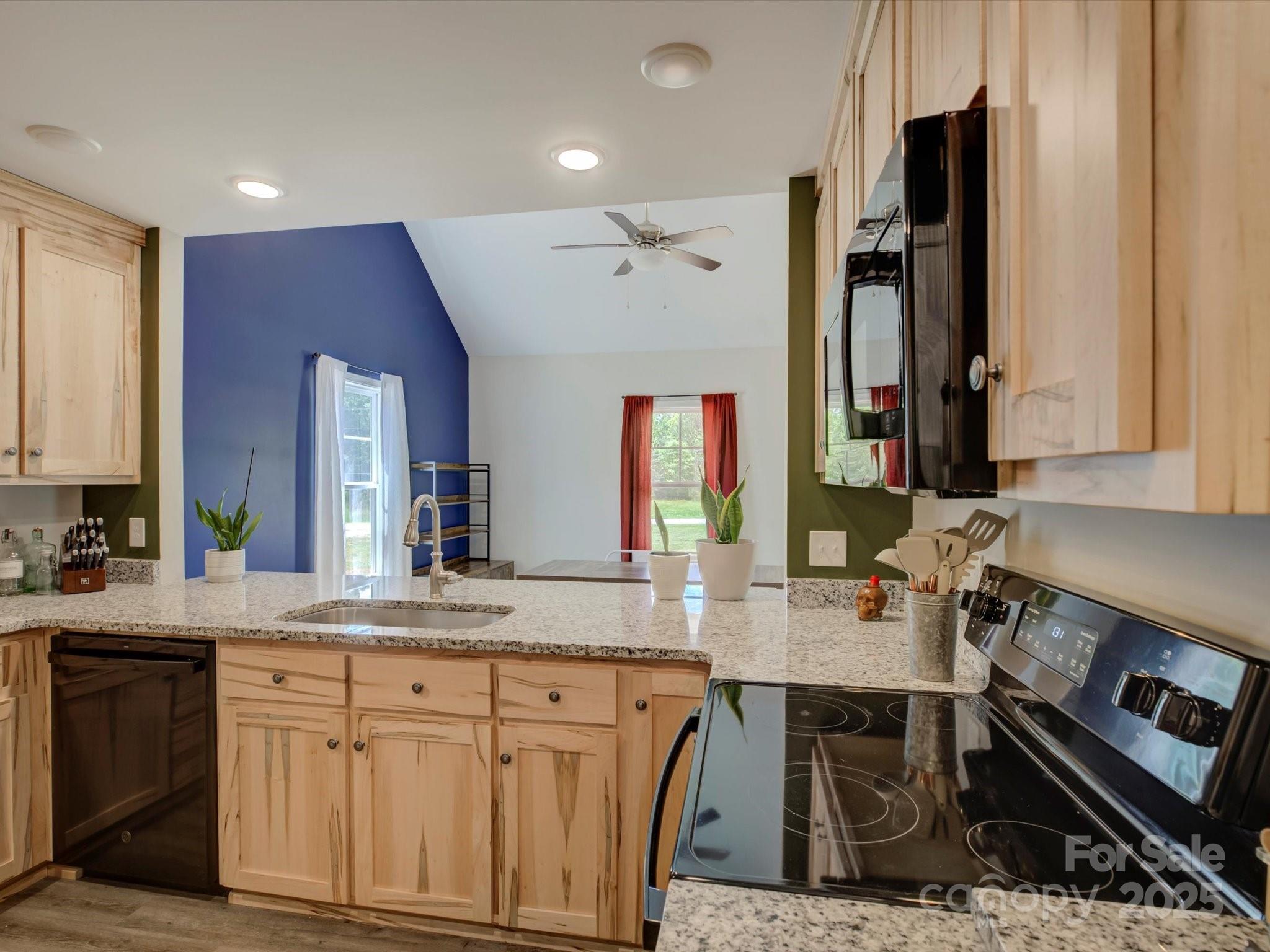 1454 King Road York, SC 29745 - Photo 12 of 34 a kitchen with a sink stove and refrigerator