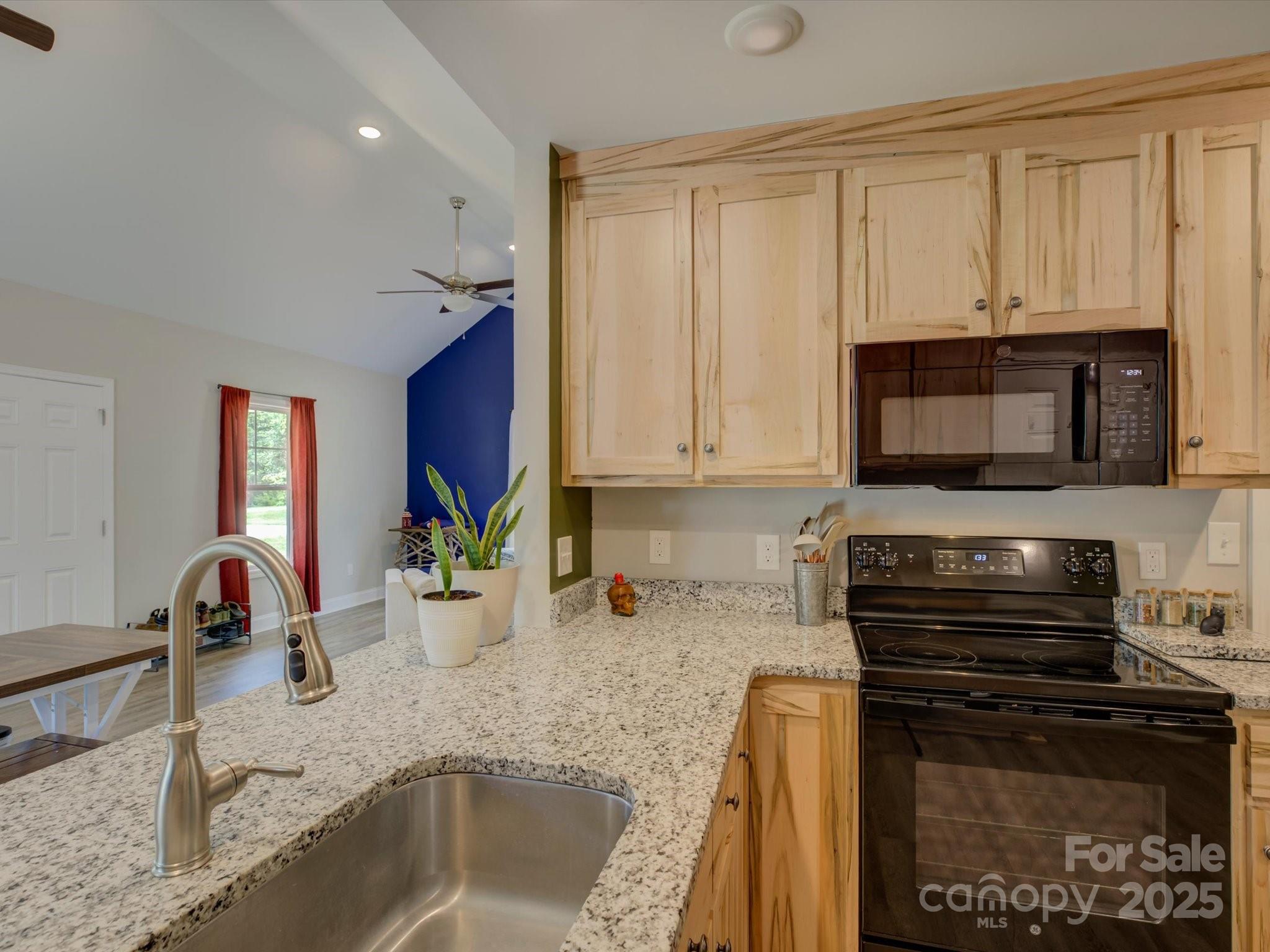 1454 King Road York, SC 29745 - Photo 14 of 34 a kitchen with a sink appliances and cabinets