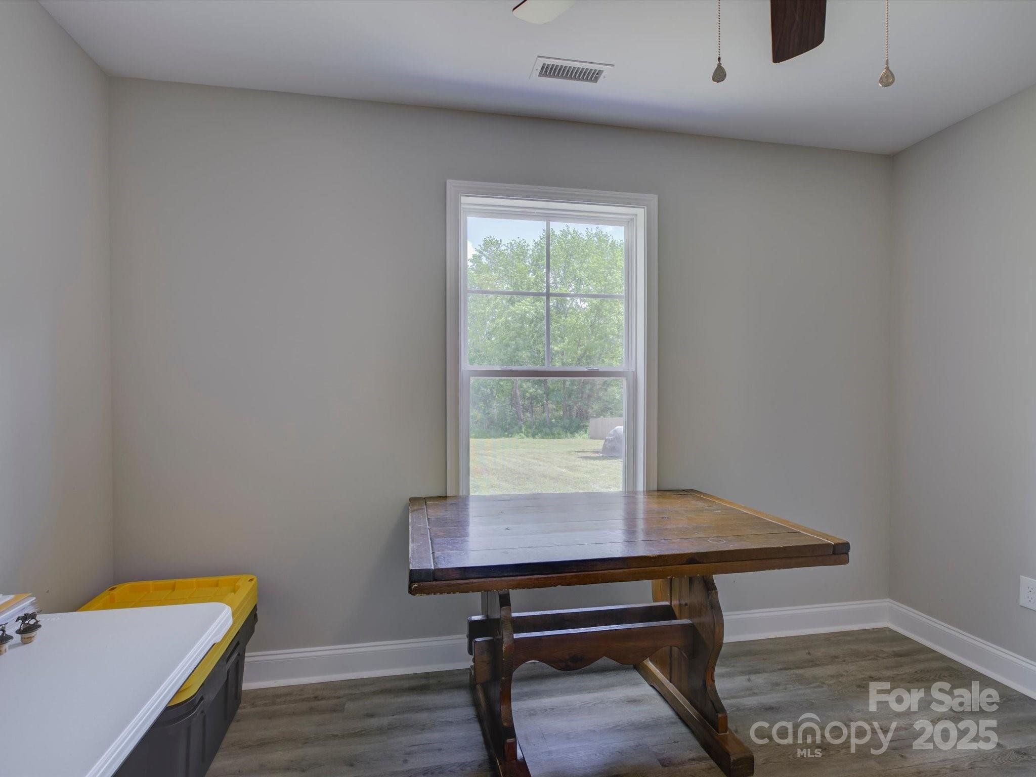 1454 King Road York, SC 29745 - Photo 24 of 34 a view of a workspace with furniture and wooden floor