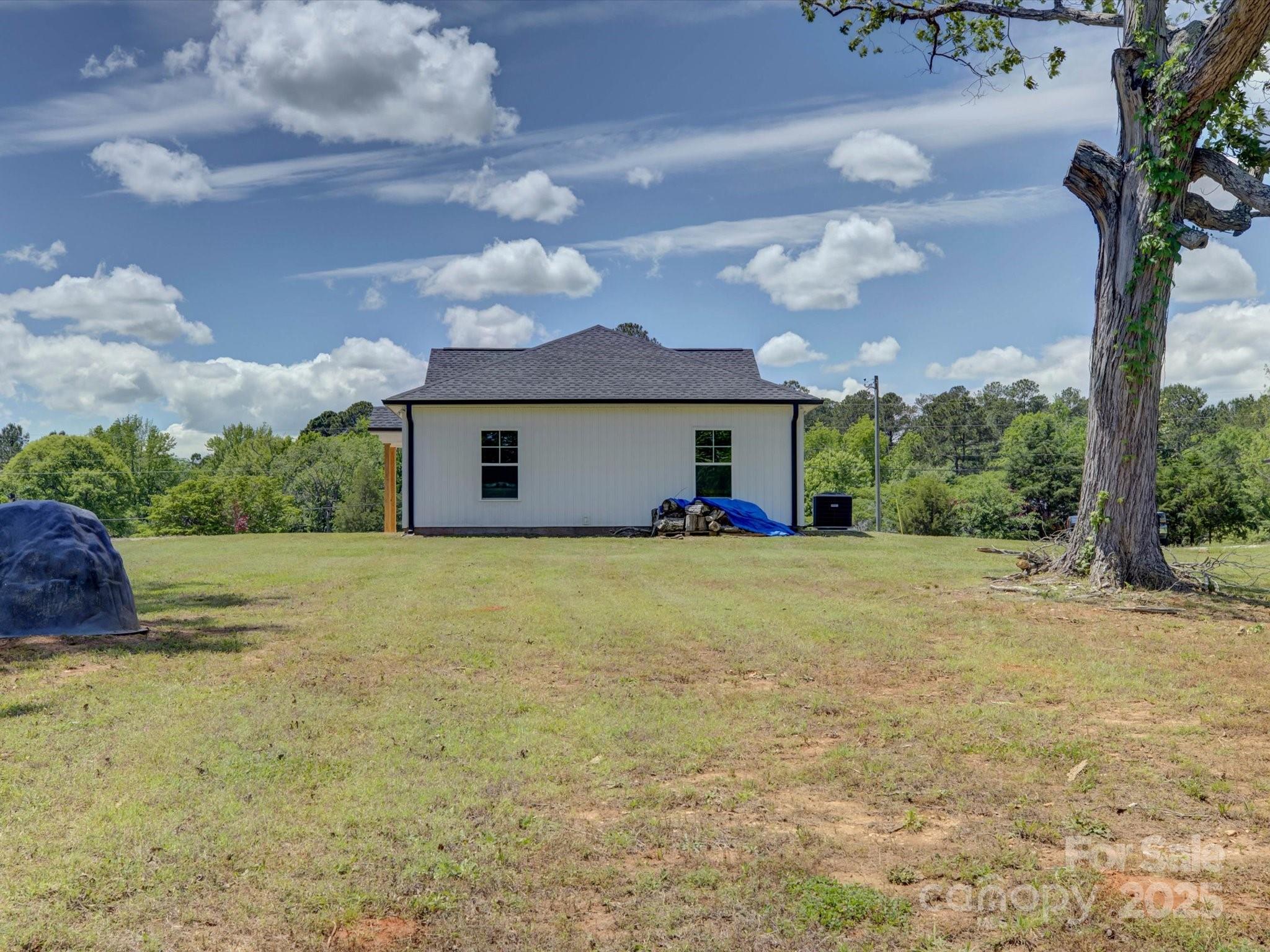 1454 King Road York, SC 29745 - Photo 30 of 34 a view of a house with a yard and garage