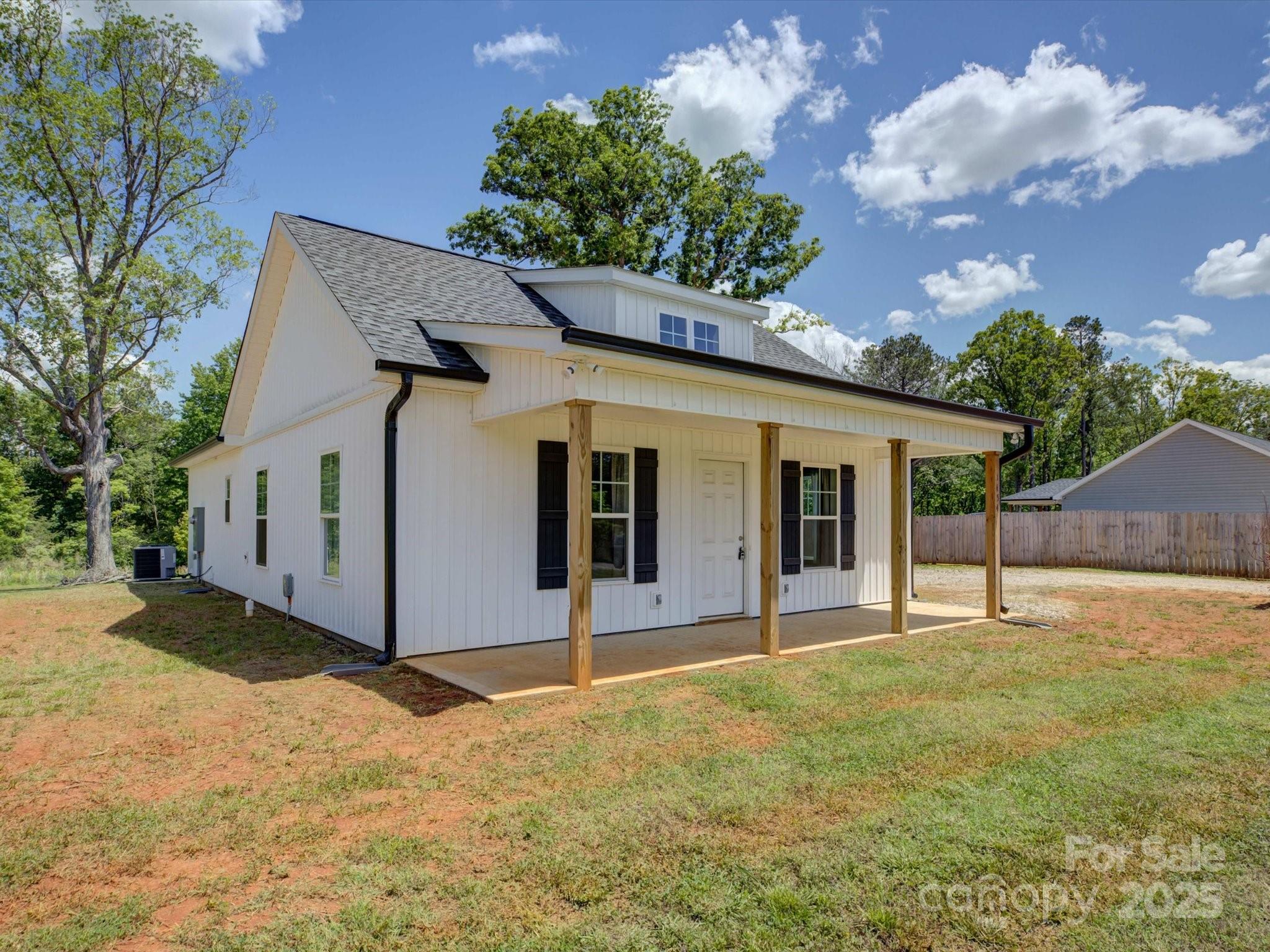 1454 King Road York, SC 29745 - Photo 3 of 34 a front view of a house with a yard and garage