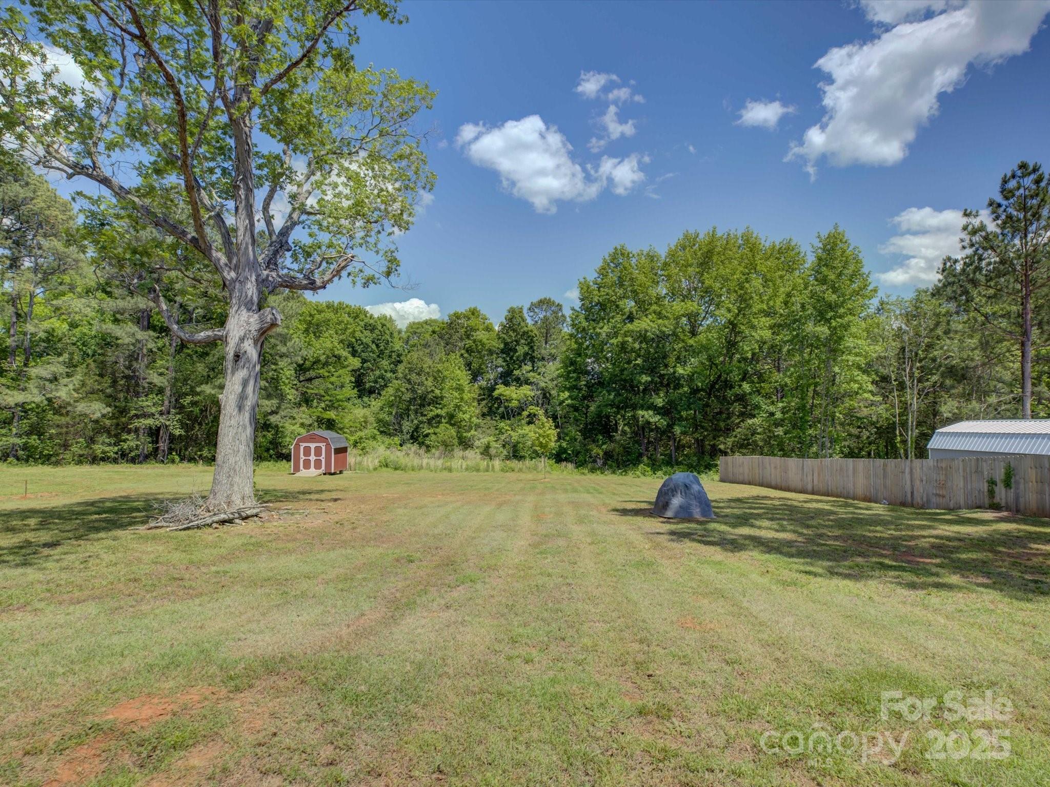 1454 King Road York, SC 29745 - Photo 34 of 34 a swimming pool with an outdoor space and seating