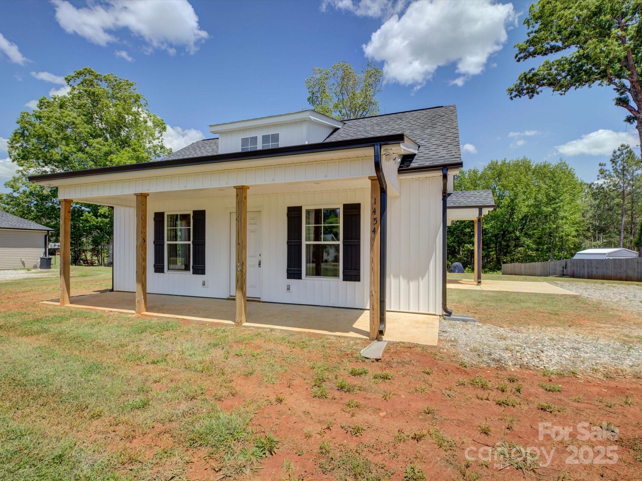 1454 King Road York, SC 29745 - Photo 4 of 34 a house with trees in the background