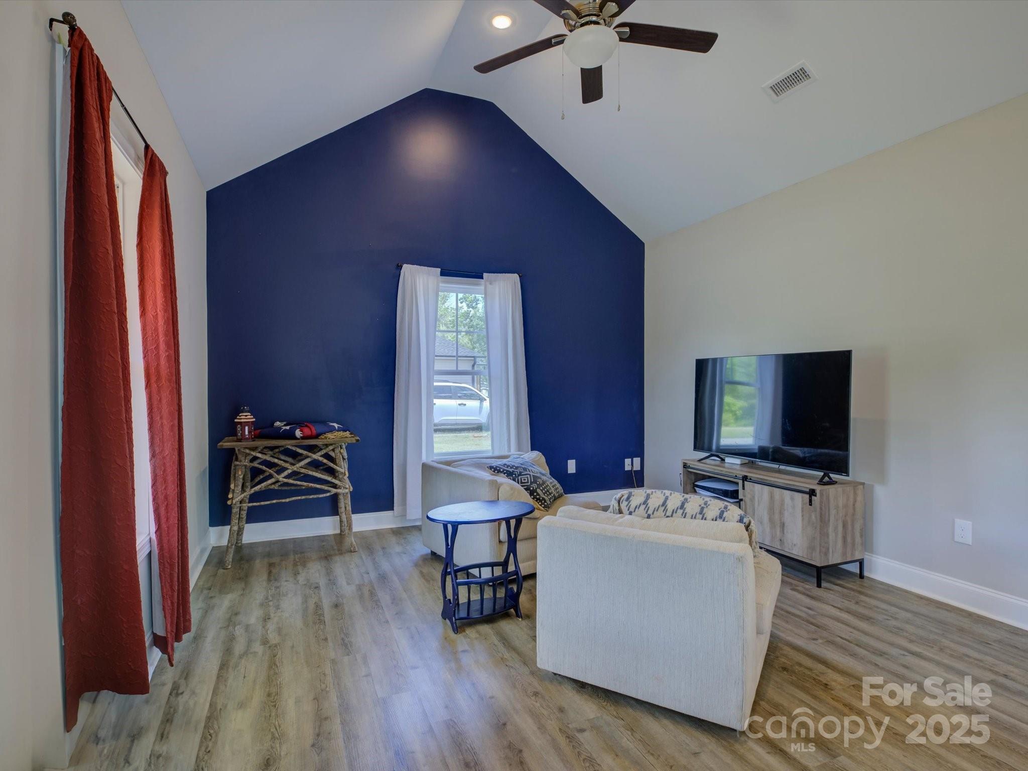 1454 King Road York, SC 29745 - Photo 7 of 34 a room with furniture and a flat screen tv