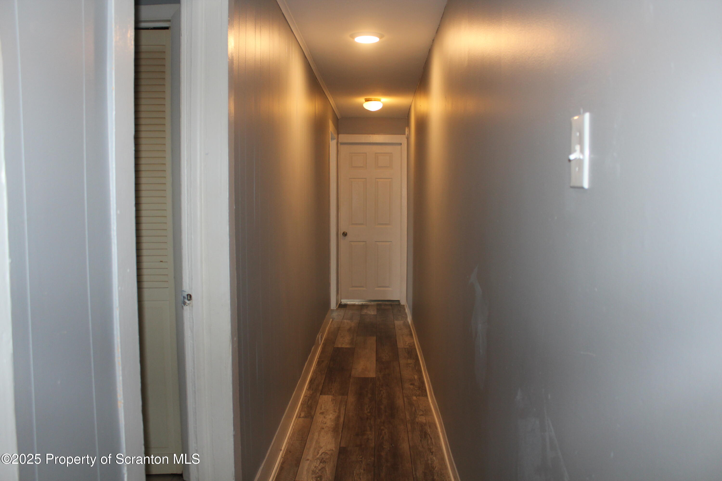 323 Union Street, Unit 1 Taylor, PA 18517 - Photo 12 of 20 a view of hallway with shower