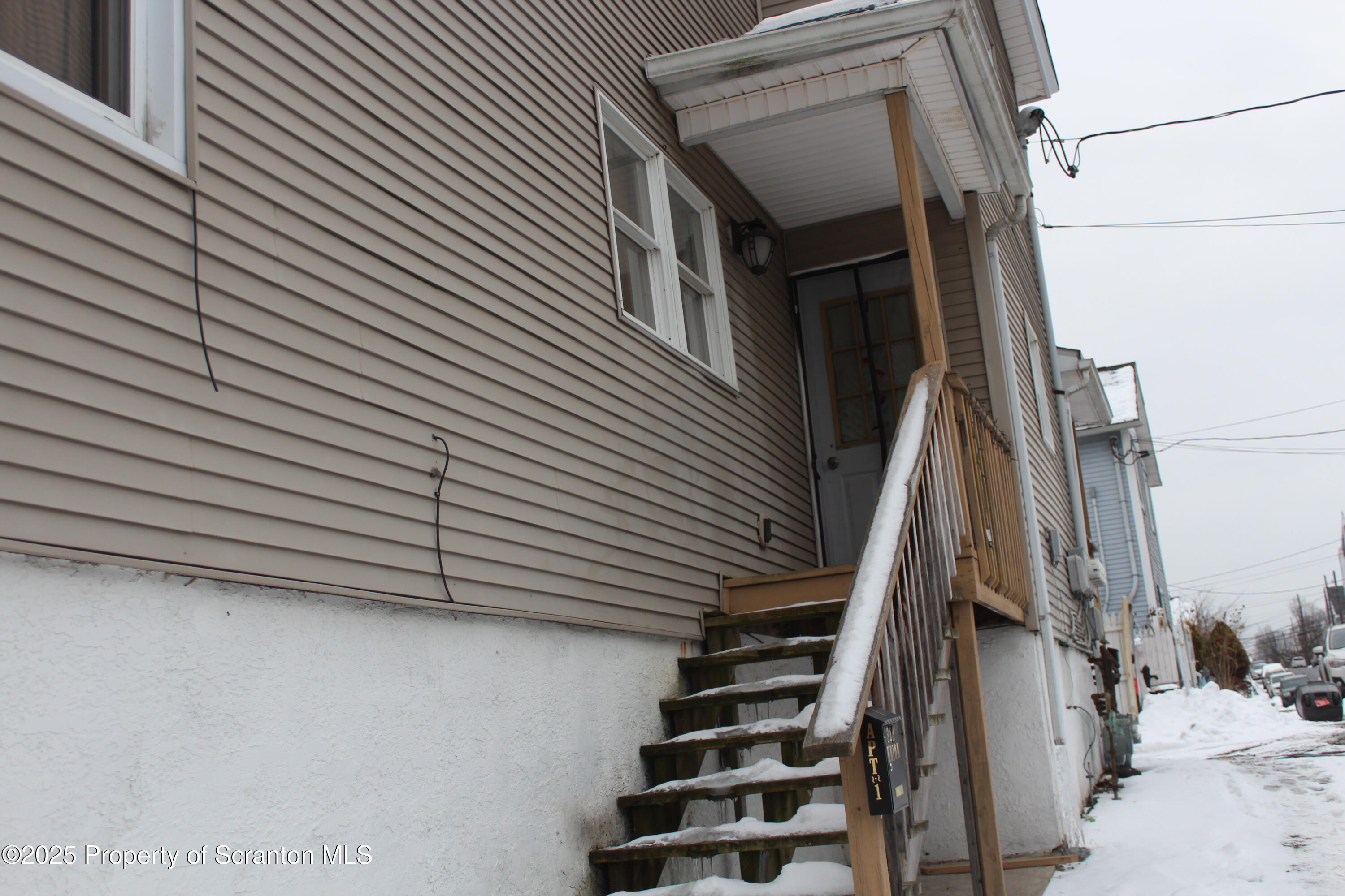 323 Union Street, Unit 1 Taylor, PA 18517 - Photo 4 of 20 a view of entryway with a front door