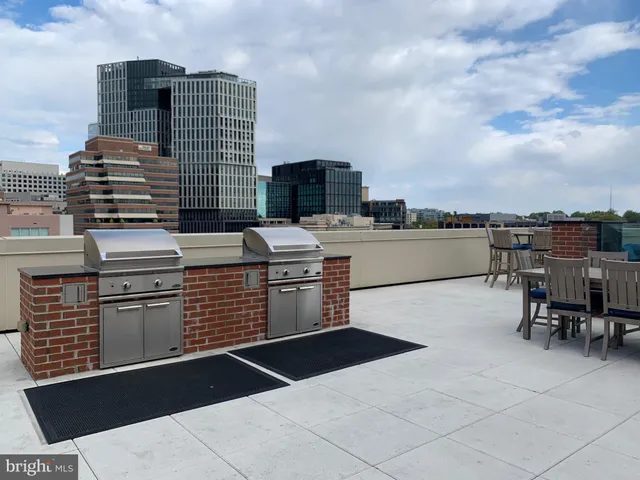 a view of multiple houses with yard