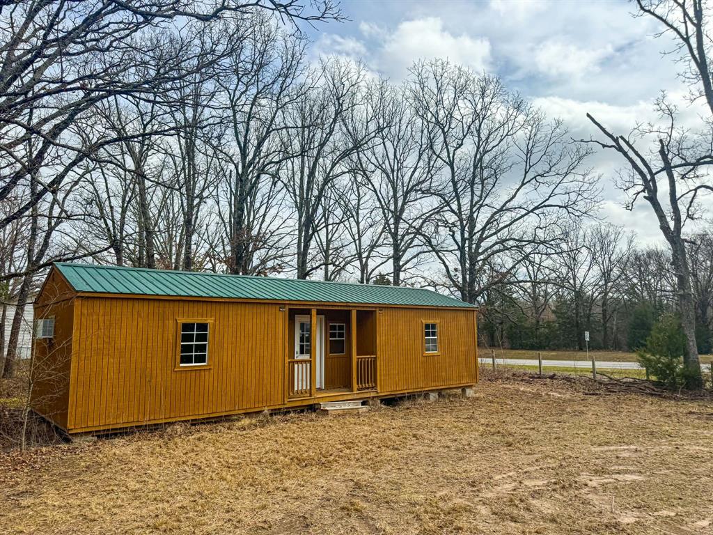 9696 Fm-515 Alba, TX 75410 - Photo 3 of 26 a view of backyard with large tree