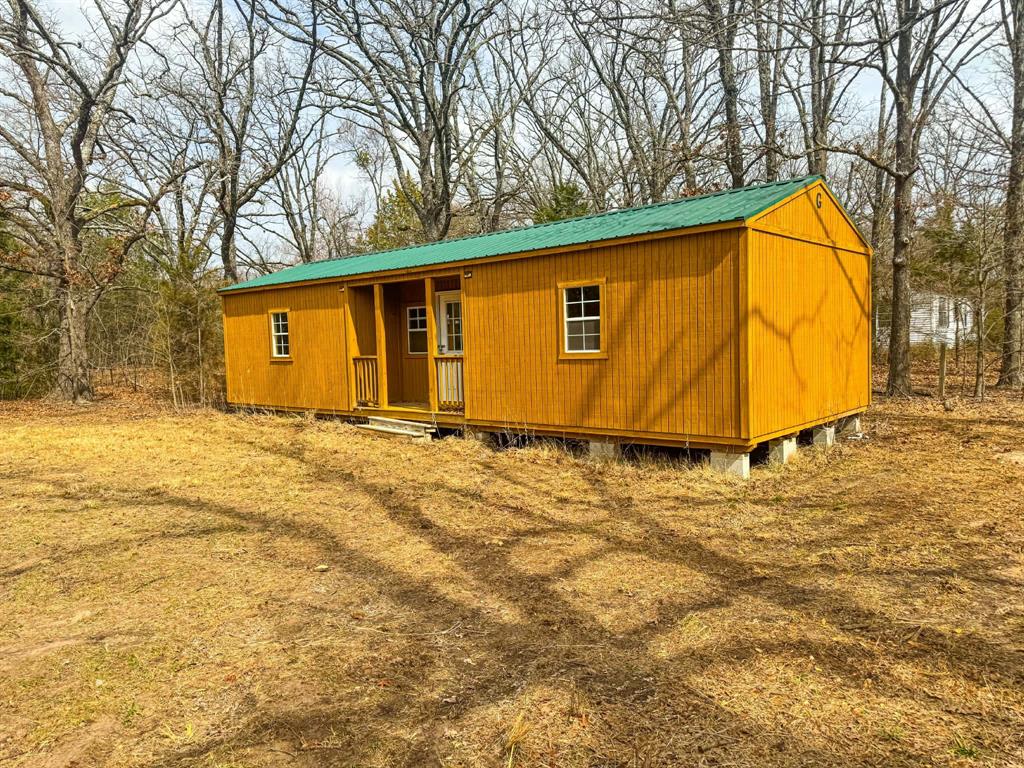 9696 Fm-515 Alba, TX 75410 - Photo 4 of 26 a blue swimming pool with a yard