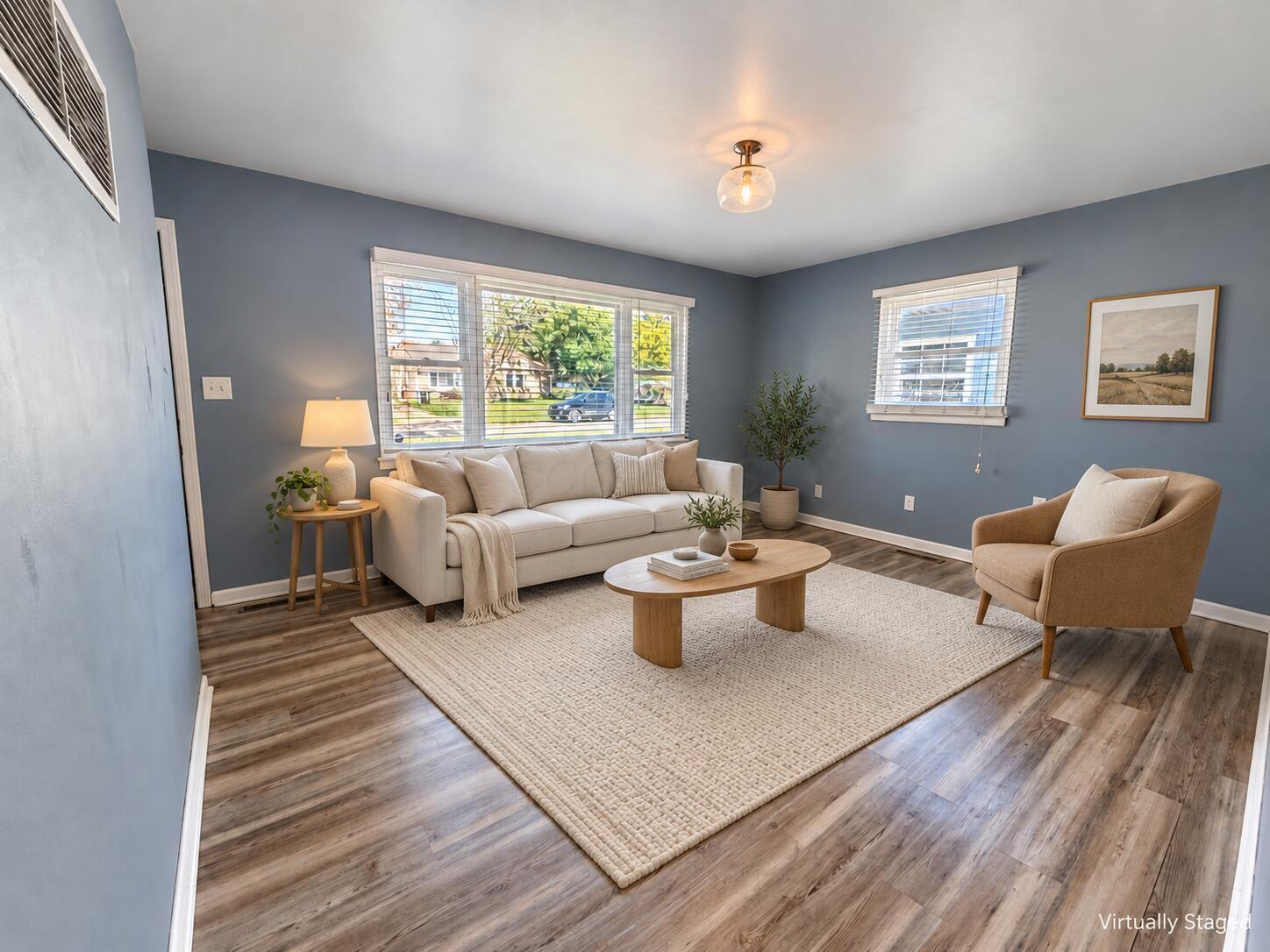 1769 Ward Road Columbus, OH 43224 - Photo 2 of 18 Living Room -Bright living space featuring low-maintenance, durable vinyl plank flooring.