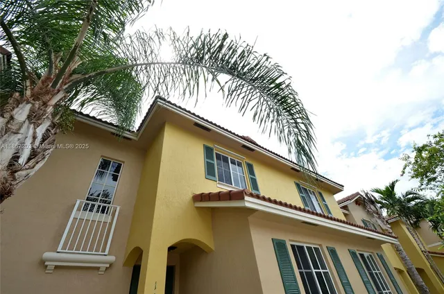 a view of a house with a roof deck