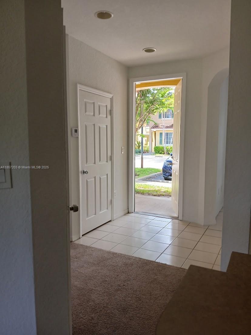 1958 Southwest 60th Terrace, Unit 1958 North Lauderdale, FL 33068 - Photo 21 of 24 a view of a room that has a window